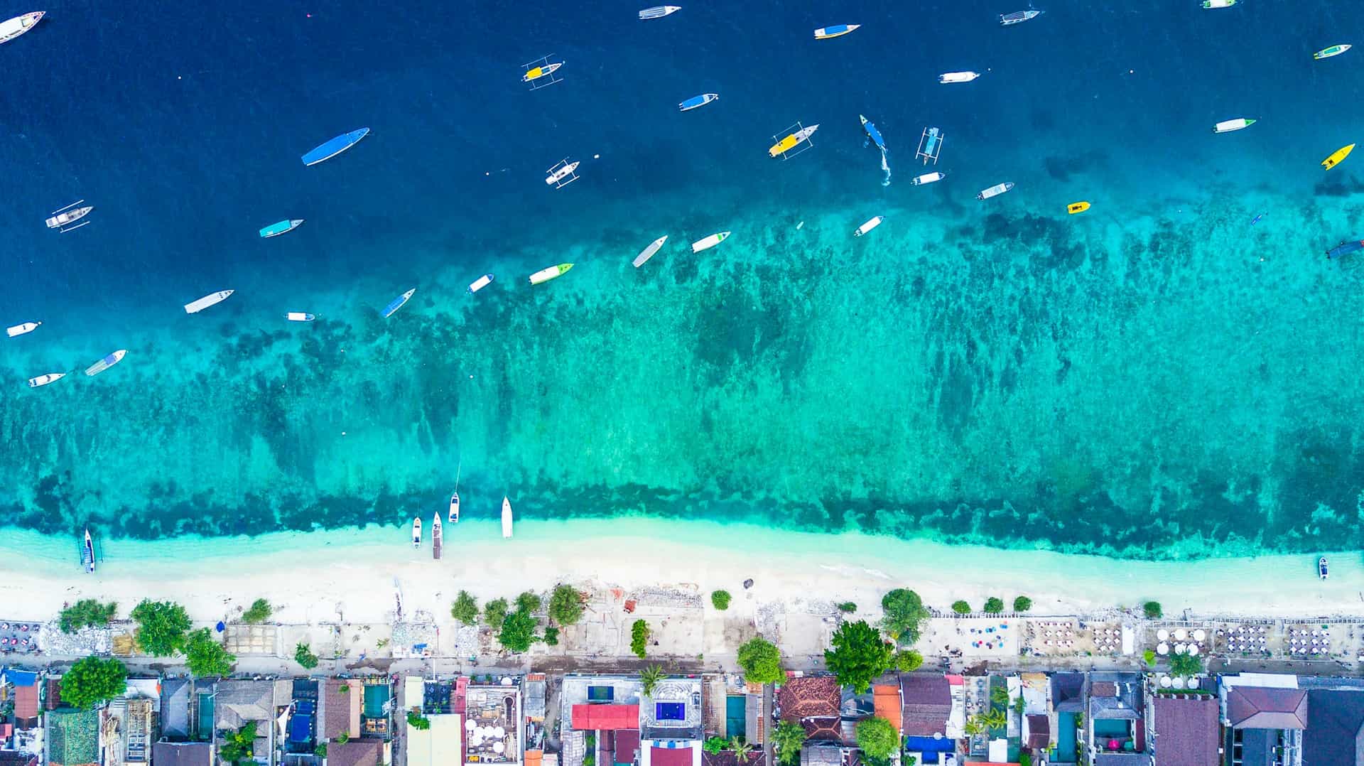 Turquoise water and the coastline of Gili Trawangan, photographed from above